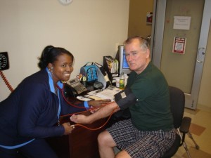 Harry gets a dose of good news on his progress from Nurse Manager Kimberly Council, RN, BSN.