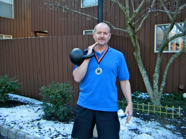 Rich sports his first-place medal won at the North Jersey Kettlebell Competition. 