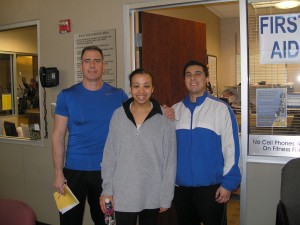 With "her guys," Trainers Lou and Anthony.
