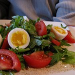 Add a protein perk to salads. Serve eggs with dark greens and tomatoes.