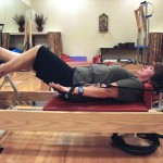 Pegi works the Pilates circuit. Here, she tackles the reformer.