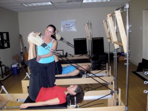 The Pilates Reformer may appear intimidating. Looks are deceiving. Stay in shape, even when you're down.